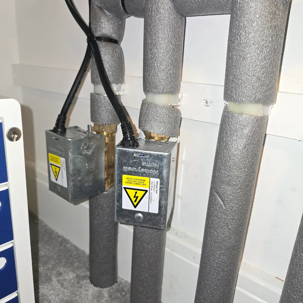 Heating pipework and motorised valves on an FHP job